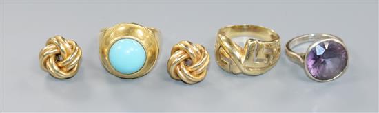 A Middle Eastern 750 yellow metal and turquoise ring, a yellow metal ring, one other ring and a pair of 9ct gold ear studs.